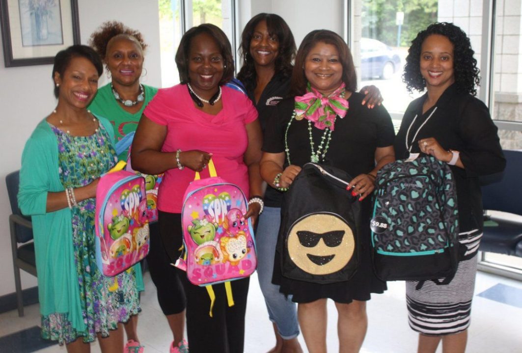 AKA gives out 500 book bags to students